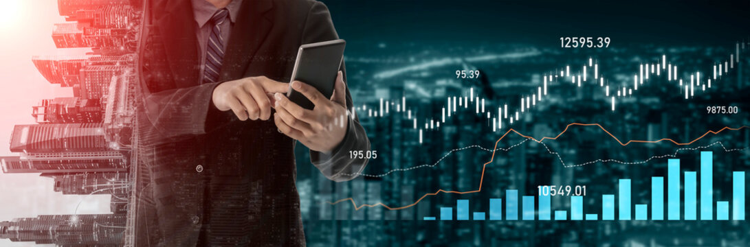 A businessman in a suit operates a mobile tablet, surrounded by dynamic financial data and stock market graphs, representing modern investment and trading strategies. Scalp - Powered by Adobe
