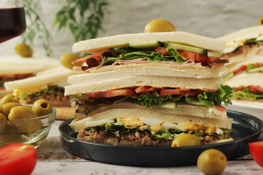 Different Italian tramezzini sandwich in tradition triangle form