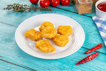 Golden crispy fried chicken nuggets