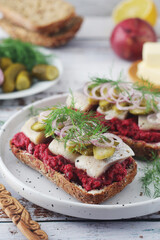 Scandinavian sandwiches with herring and beetroot