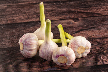 Raw young garlic bulb heap