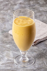 Sweet mango smoothie dessert glass