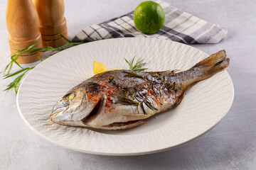Baked dorada fish with spices