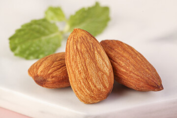 Fresh Almonds with Green Leaves - Healthy Nuts Snack