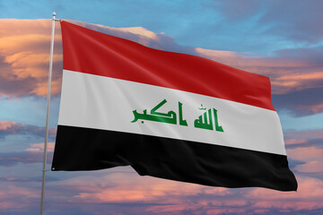 Realistic close-up of the Iraq flag waving on a tall flagpole under a bright sky with soft scattered clouds, showing smooth wind motion, vivid colors, and a clear, proud national atmosphere.
