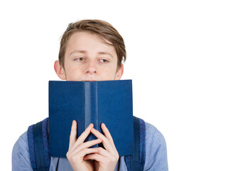 Puzzled student covering half face with an open book. Difficult task to solve, discontent guy looking lost aside. Dissatisfied expression, feels strained and exhausted of constant learning