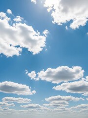 Fototapeta premium Clear Blue Sky with Fluffy White Clouds