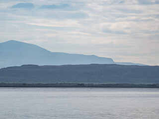 island, shore and rocks on the seashore in iceland