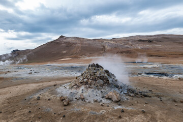 mountains and geysers in Hverir in Iceland