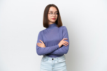 Young Ukrainian woman isolated on white background keeping the arms crossed