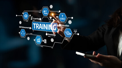 A professional engages with a futuristic training interface displaying digital elements that promote skill enhancement and knowledge acquisition in an educational setting. Tessel