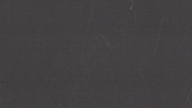 Vertical analog film grain loop with grind texture, dust and subtle imperfections. Ideal as an overlay or background for editors seeking authentic retro looks in vertical format.