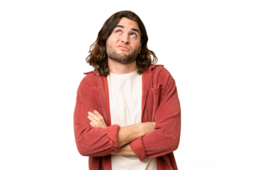 Young handsome man over isolated background making doubts gesture while lifting the shoulders