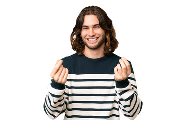 Young handsome man over isolated background making money gesture