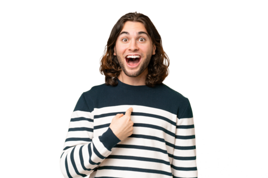 Young handsome man over isolated background with surprise facial expression