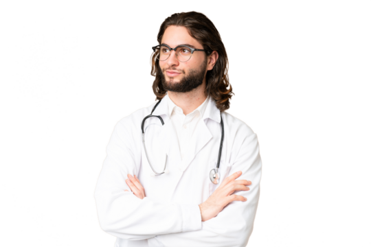 Young handsome man over isolated chroma key background wearing a doctor gown and with arms crossed looking side - Powered by Adobe