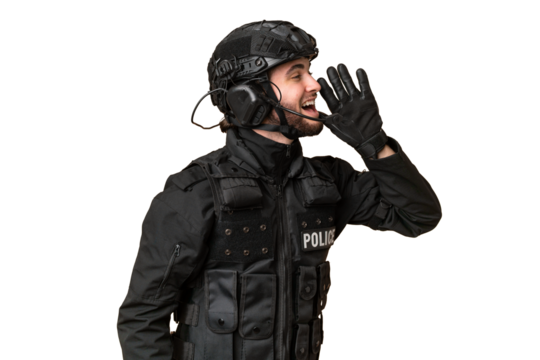 SWAT over isolated chroma key background shouting with mouth wide open to the lateral