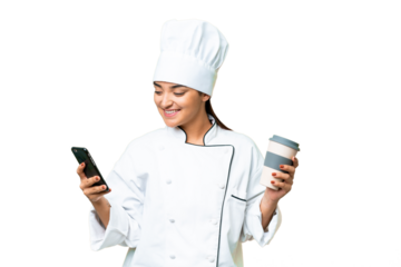 Young woman Chef over isolated chroma key background holding coffee to take away and a mobile