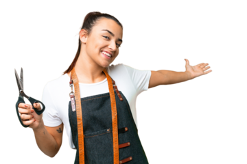 Seamstress woman over isolated chroma key background extending hands to the side for inviting to come