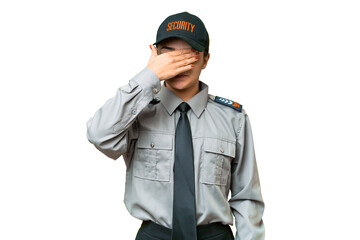 Young safeguard woman over isolated chroma key background covering eyes by hands. Do not want to see something