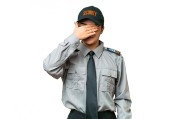 Young safeguard woman over isolated chroma key background covering eyes by hands. Do not want to see something