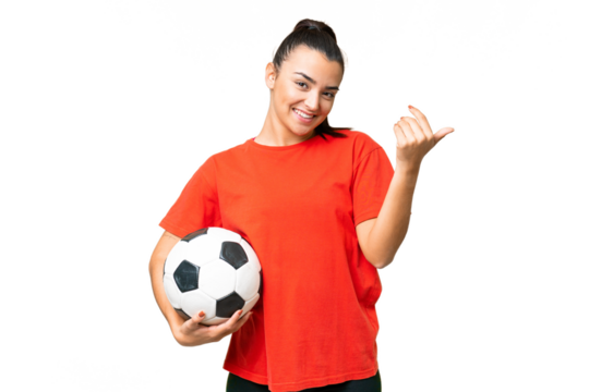 Young beauty woman over isolated chroma key background with soccer ball and doing coming gesture