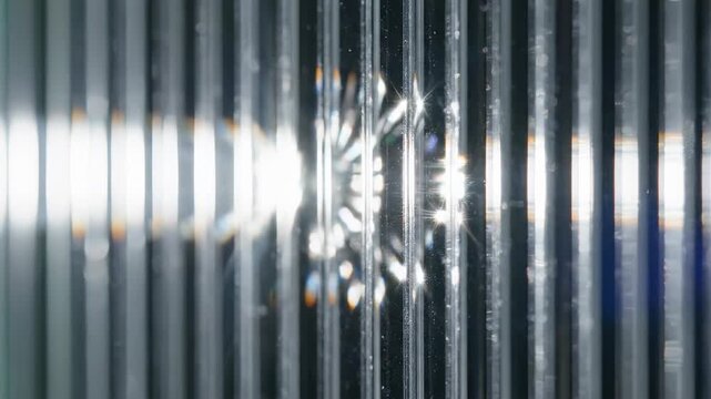 Sparkling Water Droplet: A mesmerizing macro shot captures a single, radiant droplet of water, glistening with crystalline clarity. It&rsquo;s an abstract display of the delicate beauty found in water.