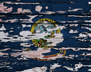 Flag of Idaho on a wooden board