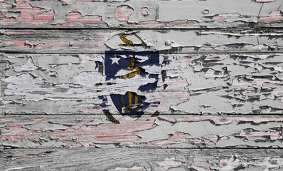 Flag of Massachusetts on a wooden board