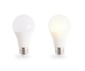 Two energy efficient eco friendly glass LED light bulbs Off and illuminated comparison isolated on white background representing modern sustainable electricity household consumption and home lighting