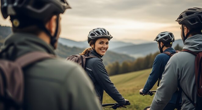 Group of cyclists enjoying a mountain bike ride exploring nature and staying active outdoors - Powered by Adobe