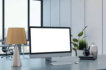Modern office desk with large computer monitor and decorative items in bright corporate interior space with white background screen. 3D Rendering