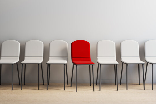 Red chair among white chairs in row symbolizing unique choice and individuality in business setting on light background. 3D Rendering