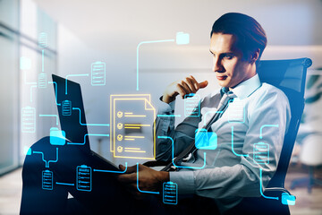Business professional analyzing digital document management system with neon workflow icons on screen in modern office environment.