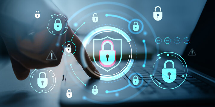 Cybersecurity concept with hand pressing laptop key surrounded by digital padlock icons on abstract light background representing data protection.