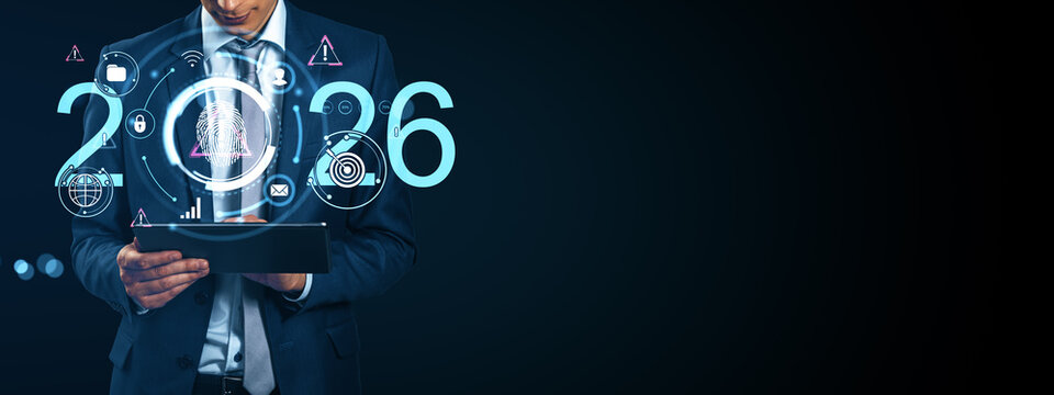 Businessman using tablet with futuristic digital interface and biometric fingerprint scan concept for 2026 cybersecurity and innovation vision.