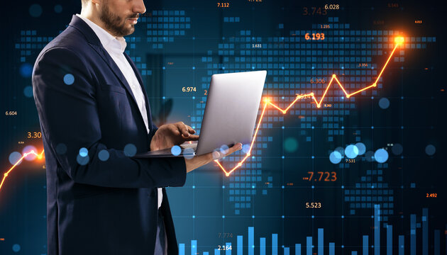 Business trader analyzing financial data on laptop with abstract glowing chart background in dark lighted digital environment concept. - Powered by Adobe