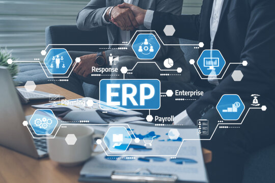 Two business professionals shake hands in a modern office, discussing ERP solutions and emphasizing collaboration, technology integration, and project management success. Tessel - Powered by Adobe