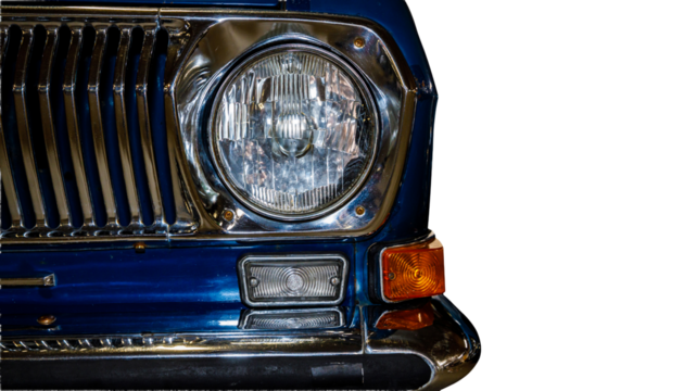 A close-up shot of the front of a blue car, suitable for use in automotive or lifestyle images