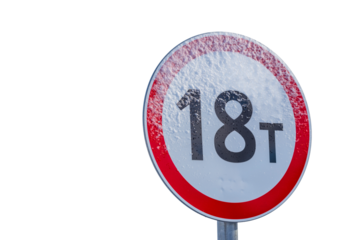 Close up shot of a sign covered in snow, great for winter themed images or backgrounds