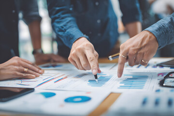 Business Team Collaborating on Data Analysis and Strategy