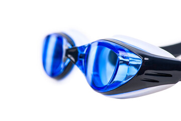 Sports swimming goggles with blue lenses on white