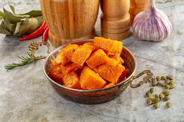 Vegan cuisine - baked pumpkin with herbs