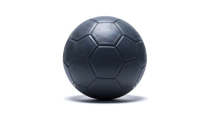 A dark grey soccer ball with hexagonal panels rests on a white surface, isolated against a clean backdrop, ready for the game