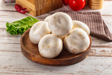 Raw white champignon mush heap