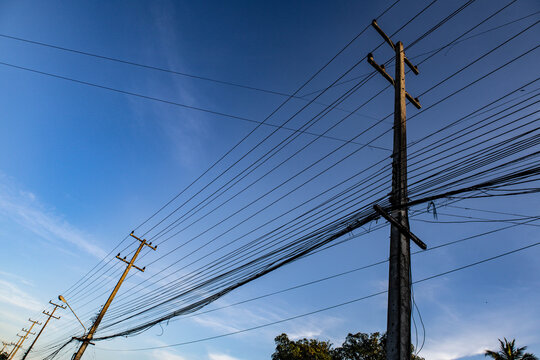 Urban Electrical Utility Pole with Messy Overhead Wiring