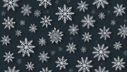 A flat lay featuring a dark blue background with detailed, white snowflakes scattered