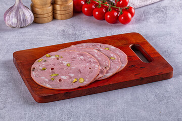 Italian mortadella pork sausages slices