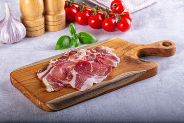 Cured pork Spanish jamon slices