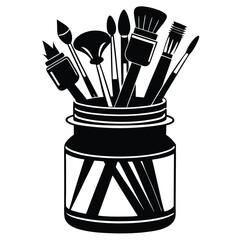Various paint brushes and artistry tools are placed stylishly within a decorative black jar